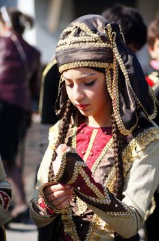 TBILISI, GEORGIA - OCTOBER 9: Participants of Georgian Folk Autumn Festival - Tbilisoba, in adjarian traditional costume dancing Ajaruli dance, October 9, 2011 in Tbilisi, Georgia.