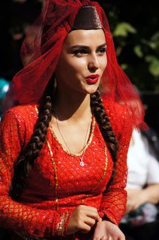 TBILISI, GEORGIA - OCTOBER 9: Participants of Georgian Folk Autumn Festival - Tbilisoba, in adjarian traditional costume dancing Ajaruli dance, October 9, 2011 in Tbilisi, Georgia.