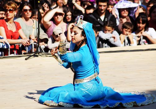 TBILISI, GEORGIA - OCTOBER 9: Participants of Georgian Folk Autumn Festival - Tbilisoba, in adjarian traditional costume dancing Ajaruli dance, October 9, 2011 in Tbilisi, Georgia.