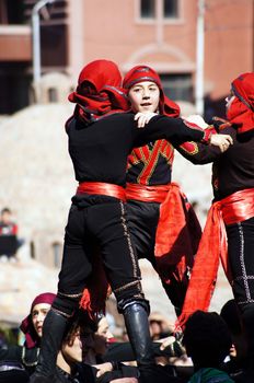 TBILISI, GEORGIA - OCTOBER 9: Participants of Georgian Folk Autumn Festival - Tbilisoba, in adjarian traditional costume dancing Ajaruli dance, October 9, 2011 in Tbilisi, Georgia.