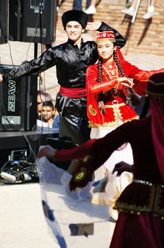 TBILISI, GEORGIA - OCTOBER 9: Participants of Georgian Folk Autumn Festival - Tbilisoba, in adjarian traditional costume dancing Ajaruli dance, October 9, 2011 in Tbilisi, Georgia.