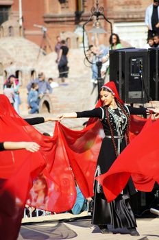 TBILISI, GEORGIA - OCTOBER 9: Participants of Georgian Folk Autumn Festival - Tbilisoba, in adjarian traditional costume dancing Ajaruli dance, October 9, 2011 in Tbilisi, Georgia.