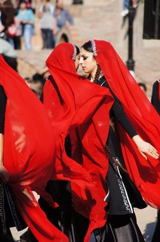 TBILISI, GEORGIA - OCTOBER 9: Participants of Georgian Folk Autumn Festival - Tbilisoba, in adjarian traditional costume dancing Ajaruli dance, October 9, 2011 in Tbilisi, Georgia.