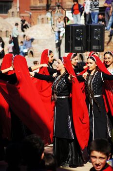 TBILISI, GEORGIA - OCTOBER 9: Participants of Georgian Folk Autumn Festival - Tbilisoba, in adjarian traditional costume dancing Ajaruli dance, October 9, 2011 in Tbilisi, Georgia.