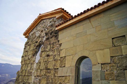 Exterior of ruins of Jvari, which is a Georgian Orthodox monastery of the 6th century near Mtskheta (World Heritage site) - the most famous symbol of georgiam christianity