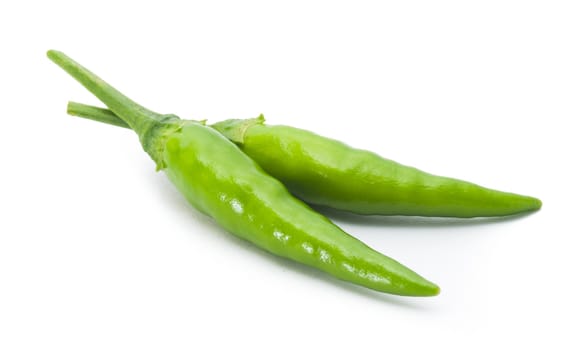 green chili on white background