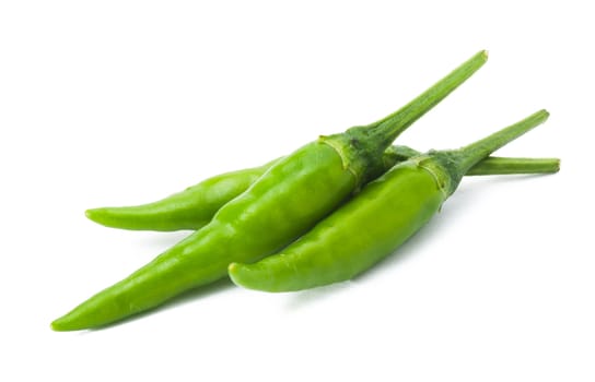 green chili on white background