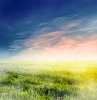 Fairy, magical landscape with sunrise fog. Morning sky and sun.