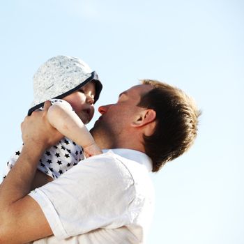 happy family blue sky on background