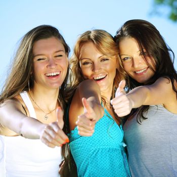 summer girlfriends in sun ligt happy and smile