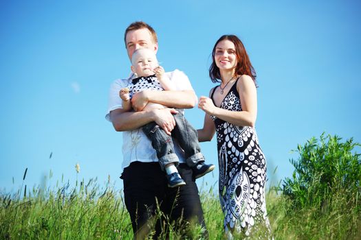 happy family blue sky on background