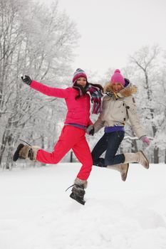 winter girl jump on snow background