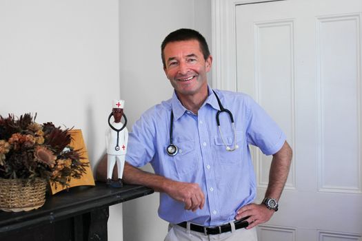 Standing white Doctor With A Stethoscope