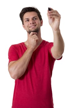 Young man with red t-shirt writing with permanent marker