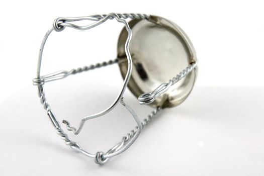 champagne cork wires on a white background