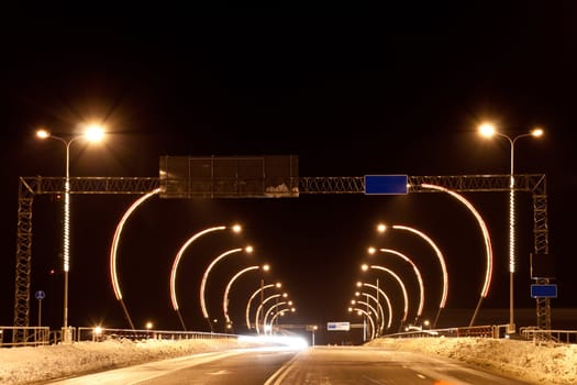 The bridge at night with lanterns and lights