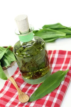 a bottle garlic tincture on a white background