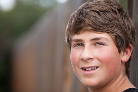 Confident Teenager Smiling at Camera shot outdoors