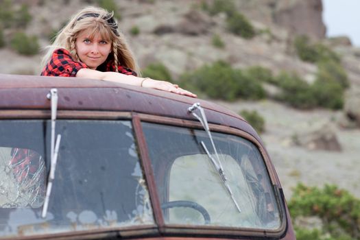 Pretty Blonde Girl in a Vintage old truck