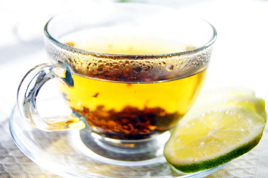 Cup of tea with lemon and mint