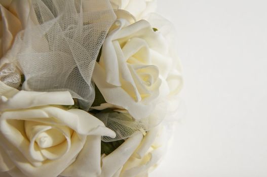 Wedding decoration - white roses bouquet, rings, bride and groom