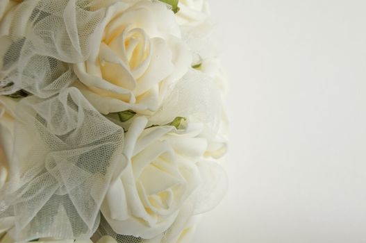 Wedding decoration - white roses bouquet, rings, bride and groom