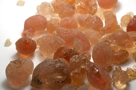 Gum arabic pieces in light back