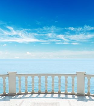 balcony near sea under cloudy sky