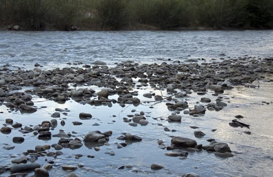 water flow over the rocks in the river