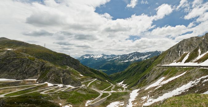 European Alpine serpentine on a cloudy day after a heavy winter