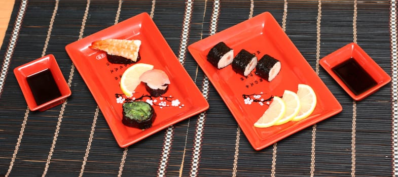 fresh sushi in plate with lemon