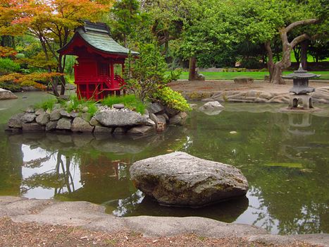 A photograph of an Asian style garden located at a public park.