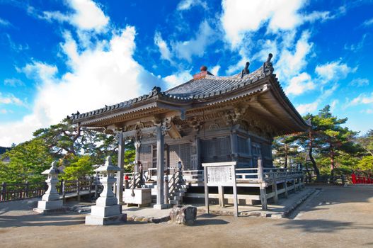 Zen temple in a garden at a sunny morning