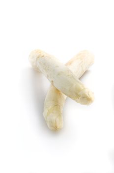 Beautiful white jumbo asparagus close up shoot over white