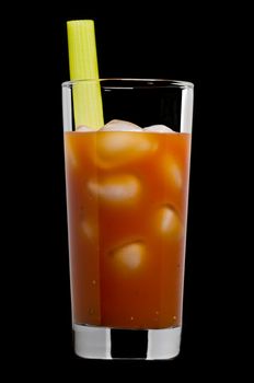 Bloody mary cocktail over a black background