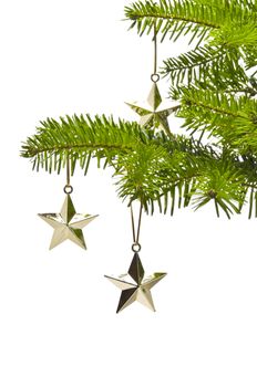 Three golden star as Christmas tree decoration, over white