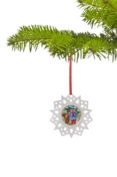 A Snow star shape ornament as Christmas tree decoration, over white
