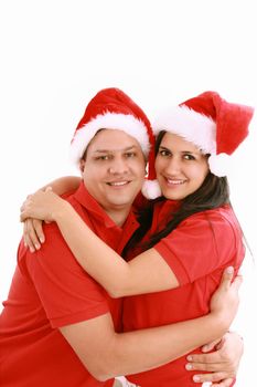 Happy christmas couple. Isolated over white background.