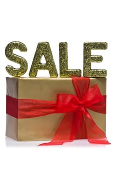 Present decorated with the word sale, over white