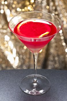 Negroni cocktail in front of different colored backgrounds