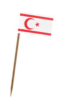 Tooth pick wit a small paper flag of North Cyprus