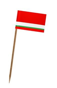 Tooth pick wit a small paper flag of Tajikistan