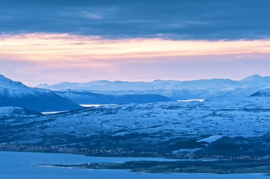 Twilight above a ford in Norway with beautifully colors, above the arctic circle