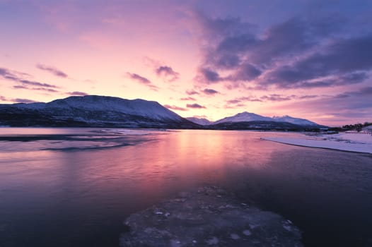 Twilight above a fjord in Norway with beautifully colors, above the arctic circle