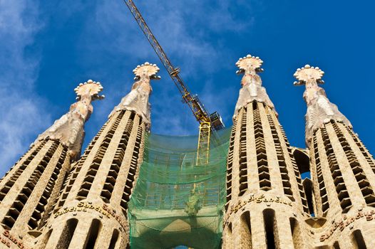 BARCELONA, SPAIN - DECEMBER 15: La Sagrada Familia Exterior - the impressive cathedral designed by Gaudi, which is being build since 19 March 1882 and is not finished yet December 15, 2011.
