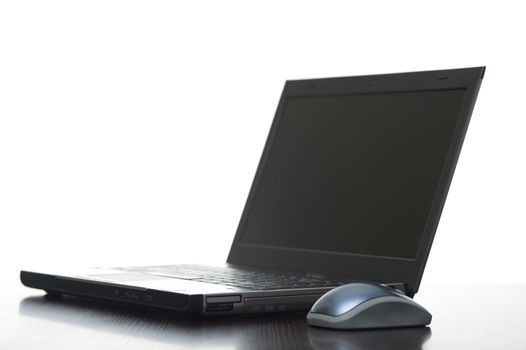 A laptop computer pictured against a white background