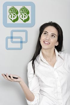 Woman holding out her mobile phone which is displaying dollar sign