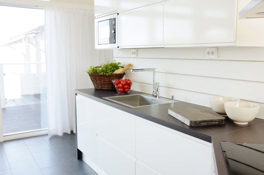 Modern white kitchen interior design.
