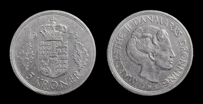 Danish 5 krone coin from 1976 isolated on black background.