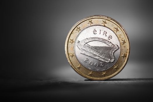 Irish one euro coin showing the national backside. Short depth-of-field.